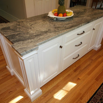 Custom White Kitchen with Scottish Meadow Granite tops