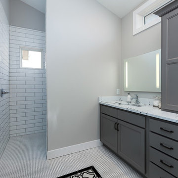 McCoy Homes Quad Cities Kitchen With White Cabinets and Matte Black Accents
