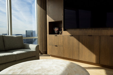 Example of a minimalist family room design in Chicago