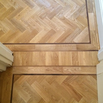 Oak wood block parquet floor with walnut inkay border