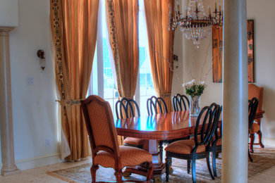 Example of a classic dining room design in Dallas