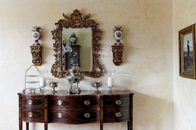 Example of a classic dining room design in New York with multicolored walls