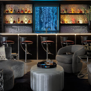 Large contemporary walk-out basement in Atlanta with grey walls and limestone flooring.