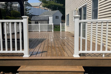 Large backyard deck photo in Newark