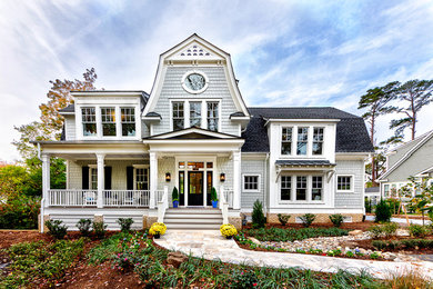 Huge beach style exterior home photo in Other