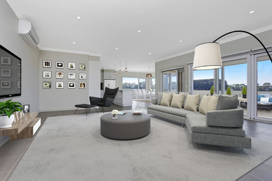 This is an example of a mid-sized contemporary living room in Melbourne.