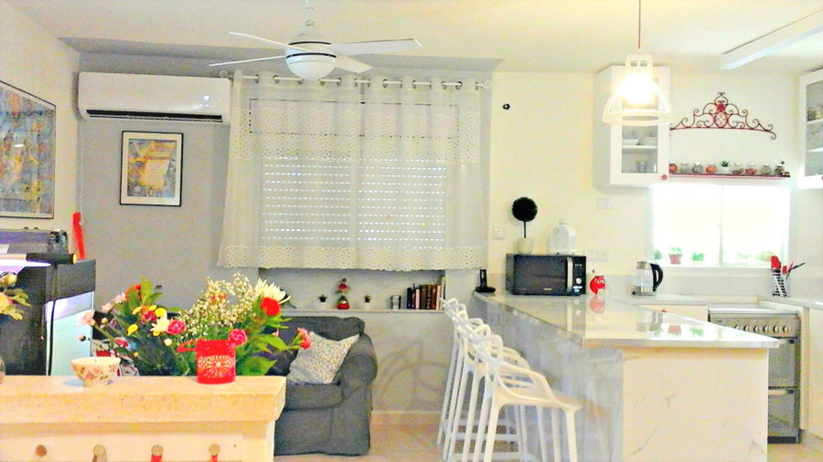 Overview of kitchen and salon as u walk in