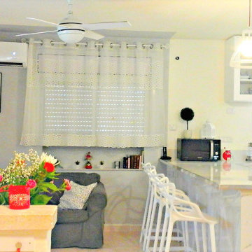Overview of kitchen and salon as u walk in