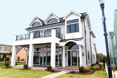 Inspiration for a coastal exterior home remodel in Little Rock