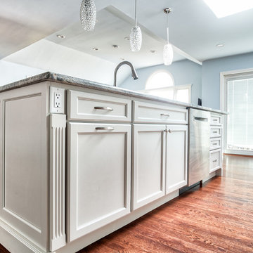 Woking Island in this open concept kitchen - Repose Gray Cabinetry