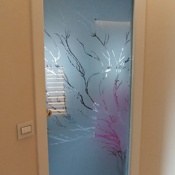 porta scorrevole curva interno muro in vetro