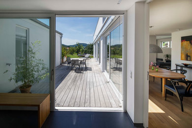Photo of a mid-sized contemporary verandah in Stuttgart.