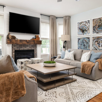 Kitchen and Sitting Room with Shiplap Hood Range and Fireplace