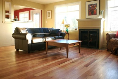 Inspiration for a traditional living room in Seattle with light hardwood floors.
