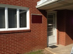 Masking A Hole In A Brick Wall Where Air Conditioning Unit Was
