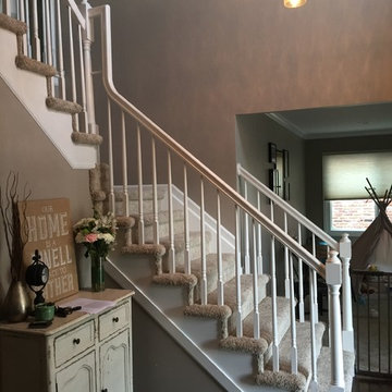 Complete house. Notably the white woodwork.