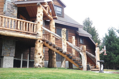 Staircase - rustic staircase idea in Other