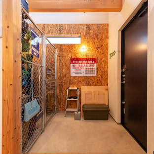 他の地域のインダストリアルスタイルのおしゃれな玄関の写真