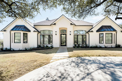 Inspiration for a transitional house exterior remodel in Austin