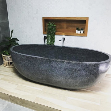 Modern Bathroom with raised free standing bath tub