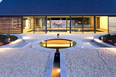 Contemporary garden in Gloucestershire with a water feature.