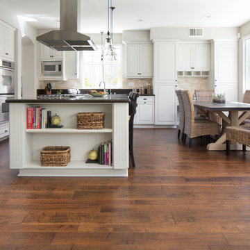 Maple, Rustic Charm. Hand scraped, Random 4”, 6”, and 8” Width, Hardwood Floor.
