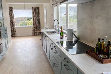 This is an example of a modern home bar in Other.