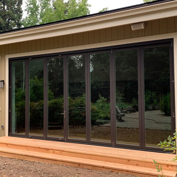 Multi-Panel Folding Weather Shield Patio Door