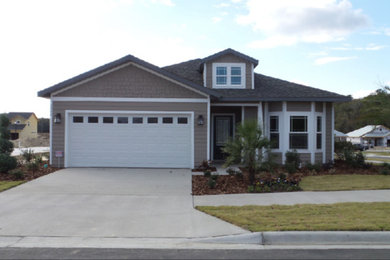 Transitional exterior home idea in Jacksonville