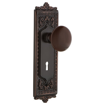 Egg and Dart With Keyhole Privacy Porcelain Knob, Timeless Bronze