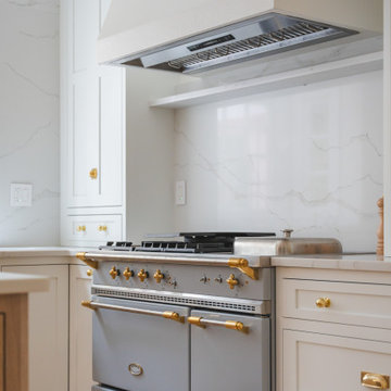 Château Charm: French-Inspired Kitchen Renovation with Plaster Hood Blue Stove a