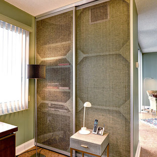 Inspiration for a medium sized modern study in Portland Maine with green walls, cork flooring and a freestanding desk.