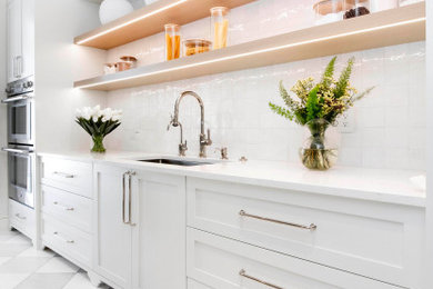 Example of a trendy kitchen design in Denver