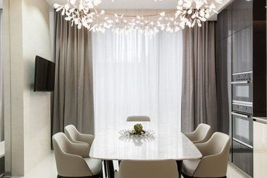Example of a mid-century modern dining room design in Toronto