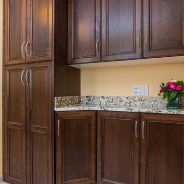 Transitional Style Laundry/Mudroom With Medium Stained Maple Cabinets