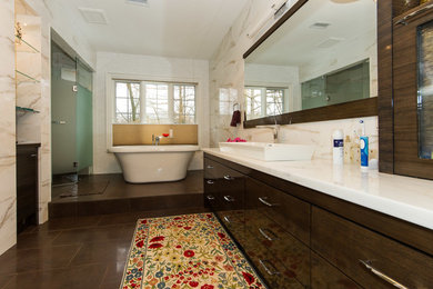 Inspiration for a mid-sized contemporary master white tile and porcelain tile ceramic tile bathroom remodel in Toronto with a trough sink, flat-panel cabinets, dark wood cabinets, quartz countertops and a one-piece toilet
