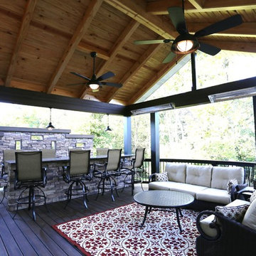 Curved Deck with Fixed Roof, Built-in Bar, and Privacy Wall