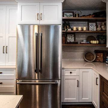 Two Tone Kitchen with Floating Shelves and Island Seating and Updated Fireplace