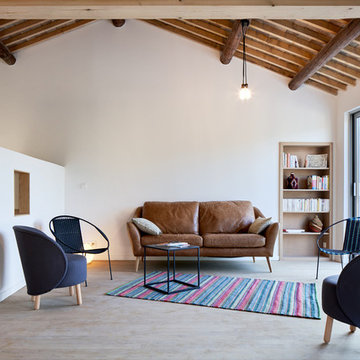 Rénovation contemporaine de ce salon avec des matériaux bruts