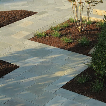 Bluestone Terraces, Porches, walkway and Plantings By Garden Artisans LLC