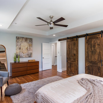 Owner's Suite with Stained Wood Barn Doors