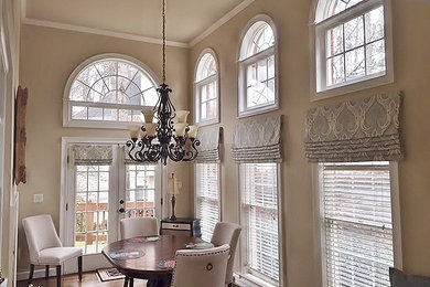 Mid-sized traditional separate dining room in Atlanta with dark hardwood floors, beige walls and brown floor.