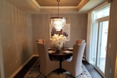 Inspiration for a small transitional separate dining room in Chicago with beige walls, dark hardwood floors, no fireplace and brown floor.