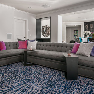 Design ideas for an expansive modern look-out basement with grey walls, dark hardwood flooring, a ribbon fireplace, a wooden fireplace surround and brown floors.