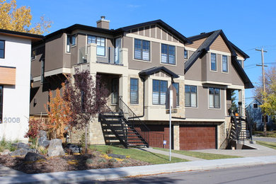 Large craftsman brown two-story mixed siding exterior home idea in Calgary