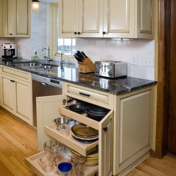 Traditional Kitchen With Ivory Cabinets and a Brown Glaze