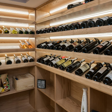 Traditional Basement Wine Cellar with Oak Racks – Chicago