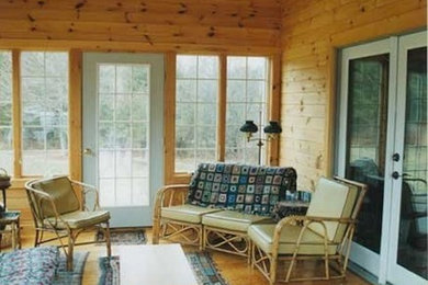 Inspiration for a small traditional sunroom in Boston with light hardwood floors.