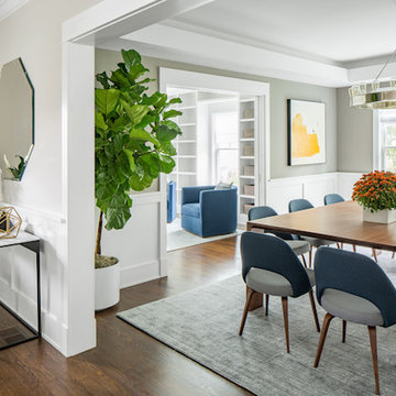 A textured arearug differentiates the dining room area.