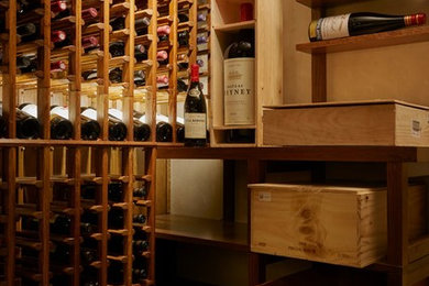 Wine cellar - traditional wine cellar idea in New York